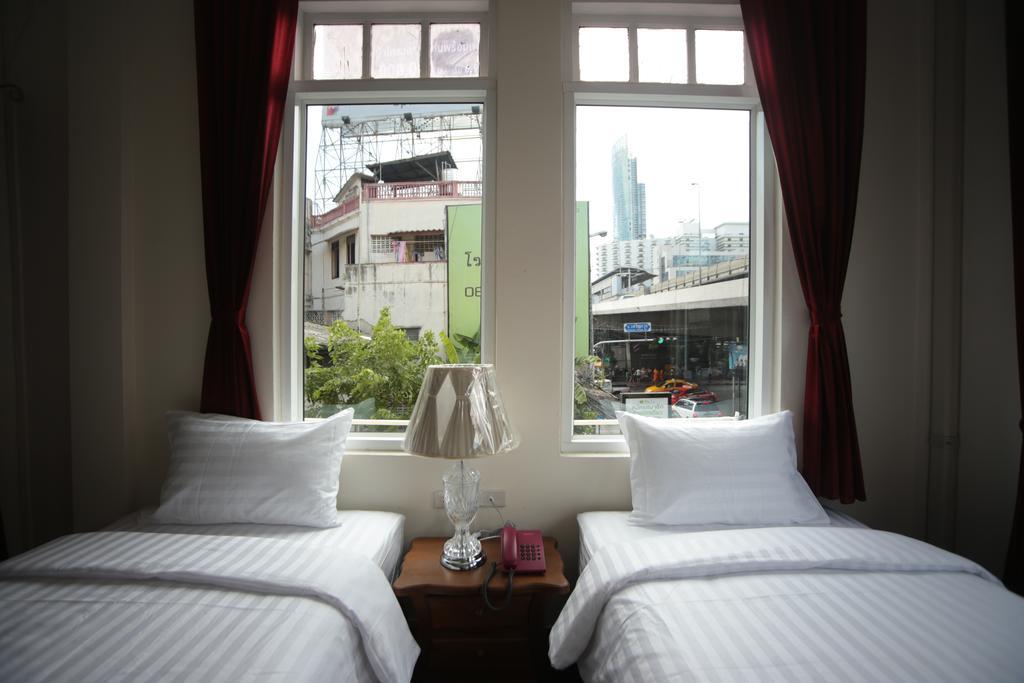 Habitación Doble esquinera con vistas a la ciudad - 2 camas